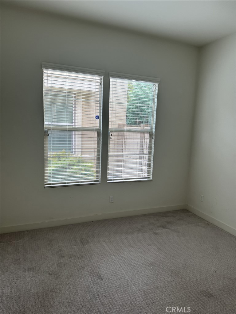 233 Radial Irvine, CA 92618 - Photo 8 of 27 a view of an empty room with a window
