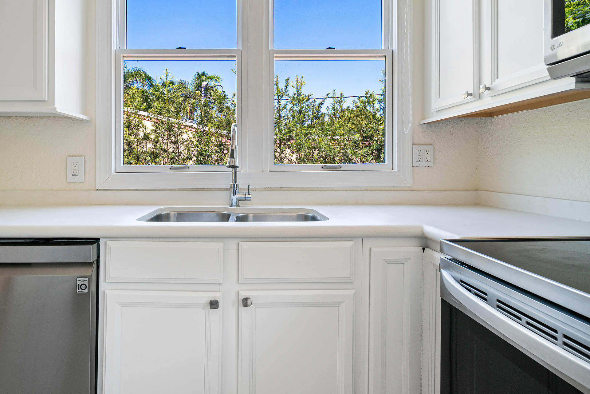 813 Avon Road West Palm Beach, FL 33401 - Photo 12 of 43 a sink with a window
