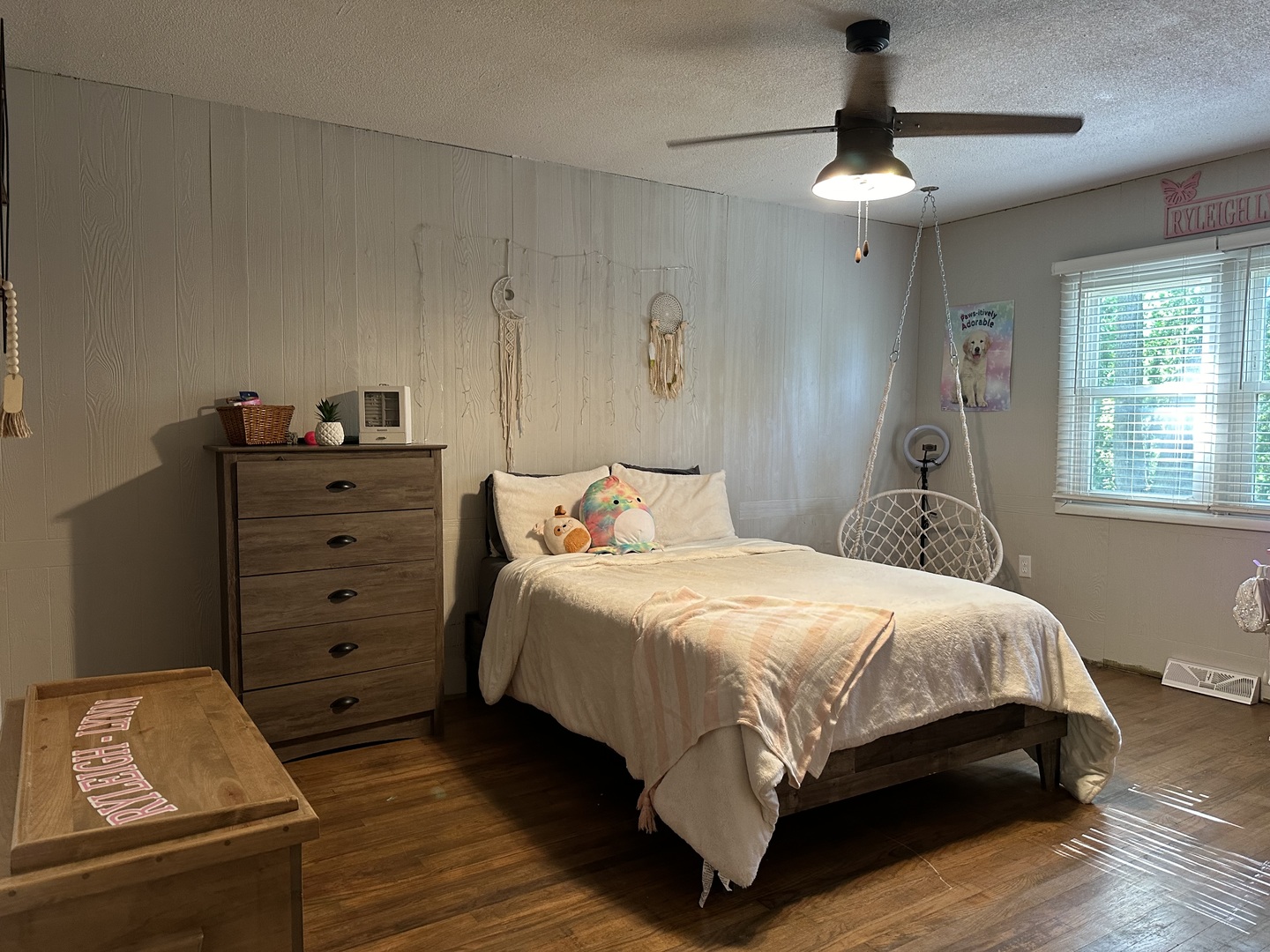 10600 Osage Road Prophetstown, IL 61277 - Photo 13 of 17 a bedroom with a bed and a chandelier