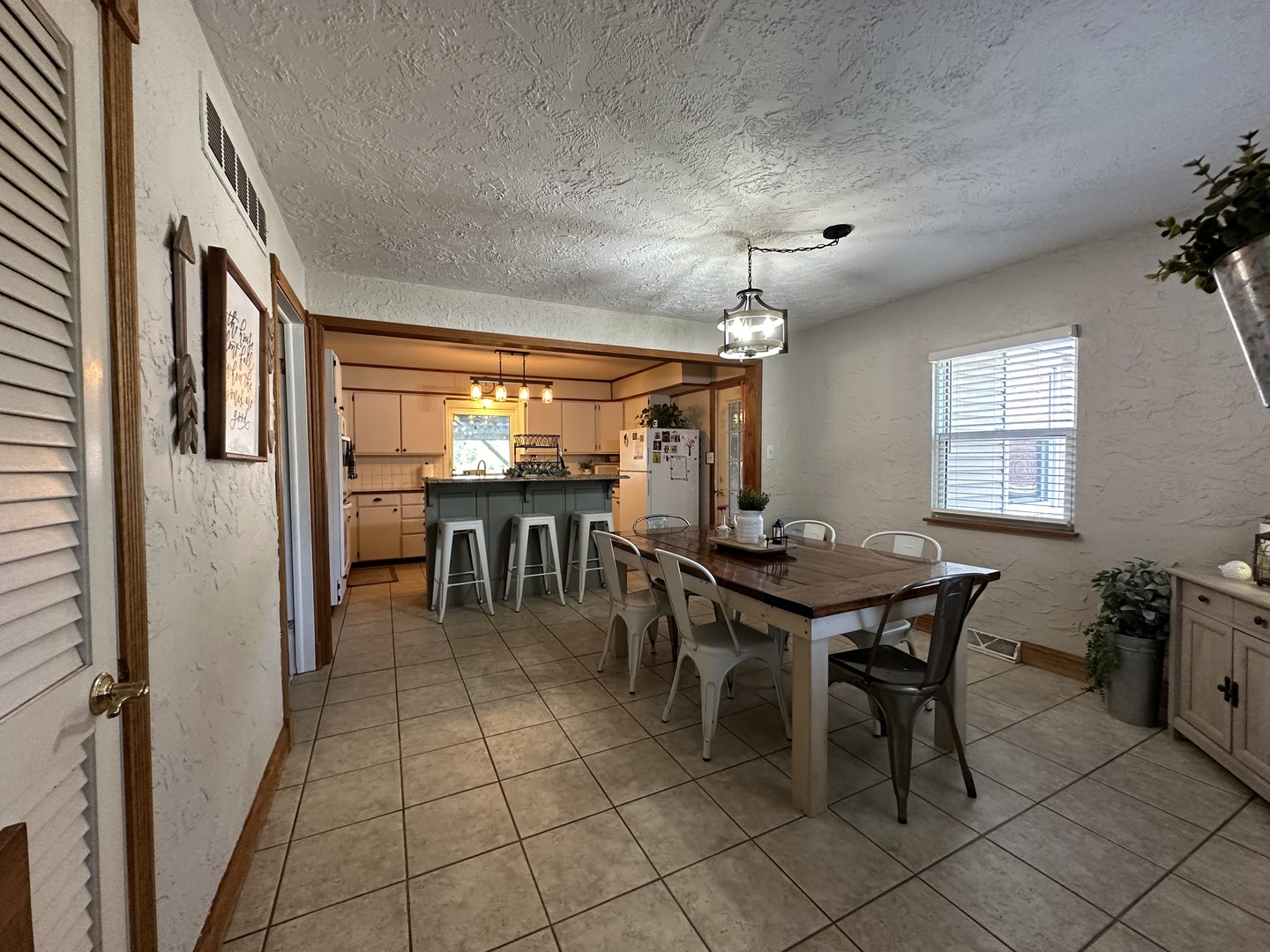 10600 Osage Road Prophetstown, IL 61277 - Photo 3 of 17 a view of a dining room with furniture and window