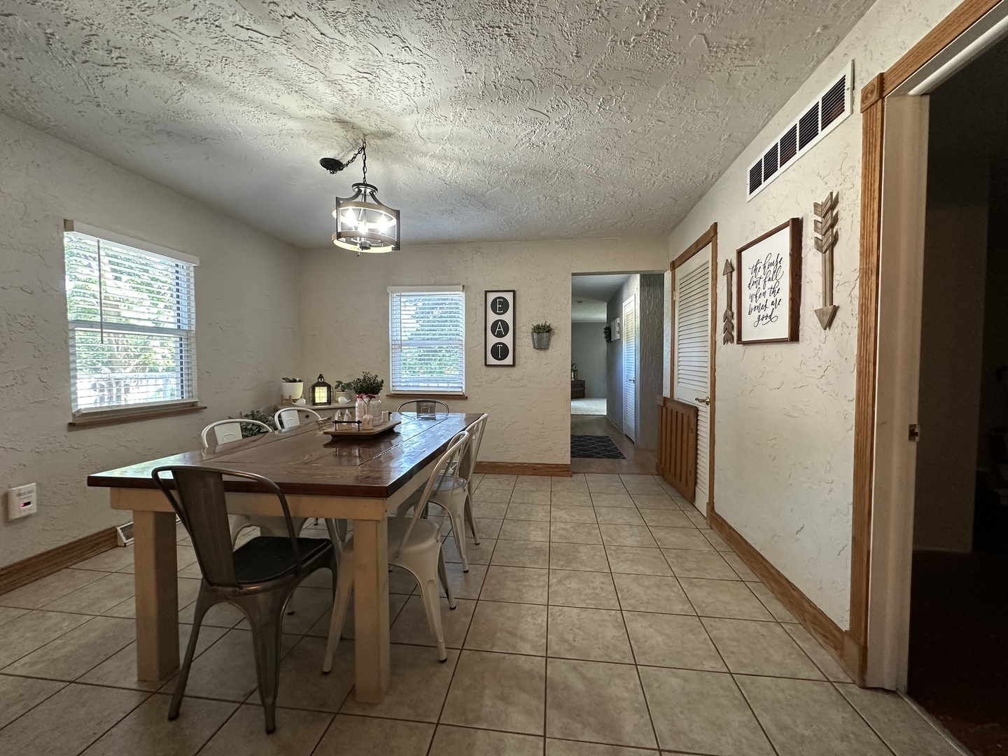 10600 Osage Road Prophetstown, IL 61277 - Photo 5 of 17 a view of a dining room with furniture and window