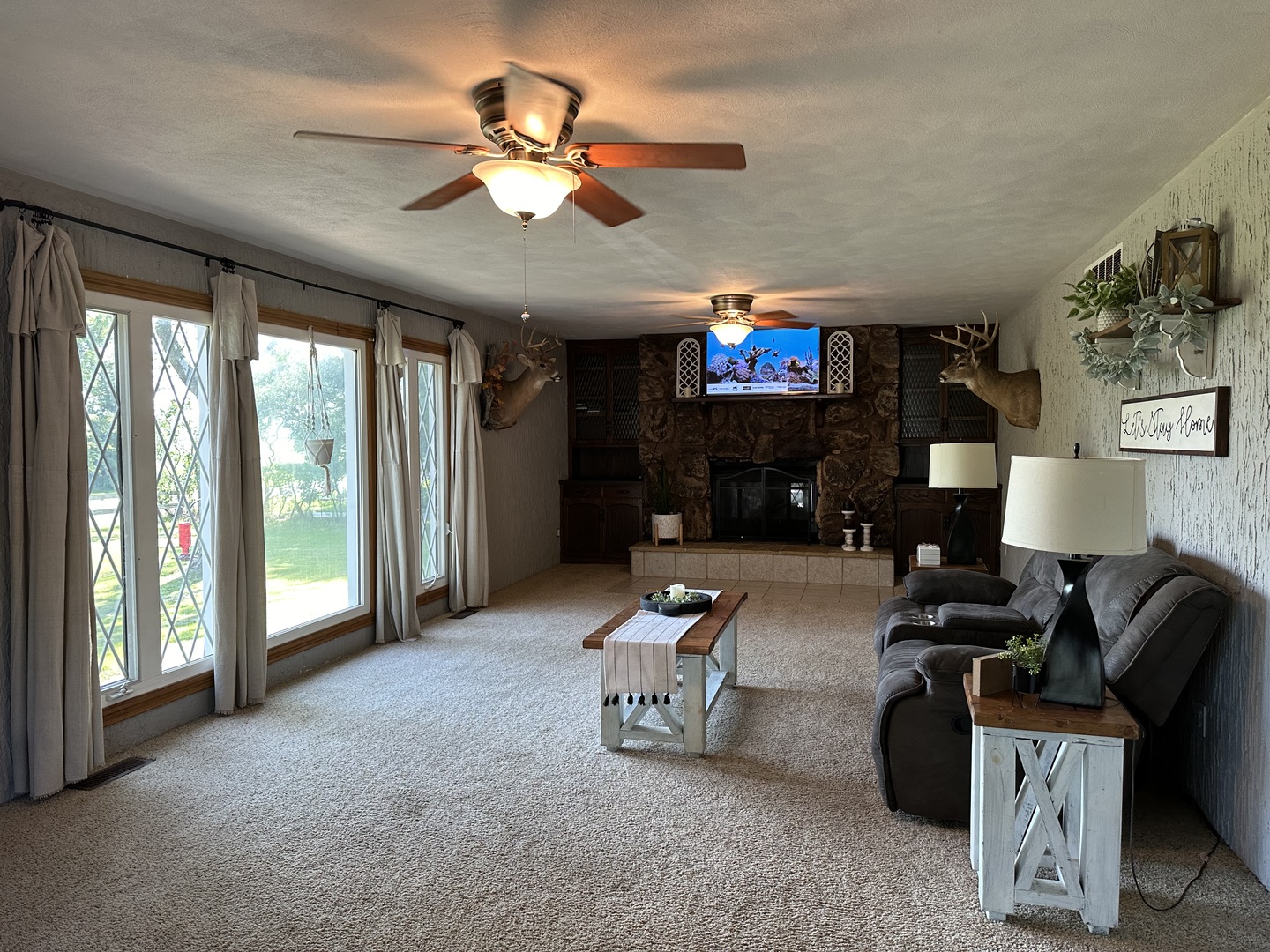 10600 Osage Road Prophetstown, IL 61277 - Photo 7 of 17 a living room with furniture and a flat screen tv