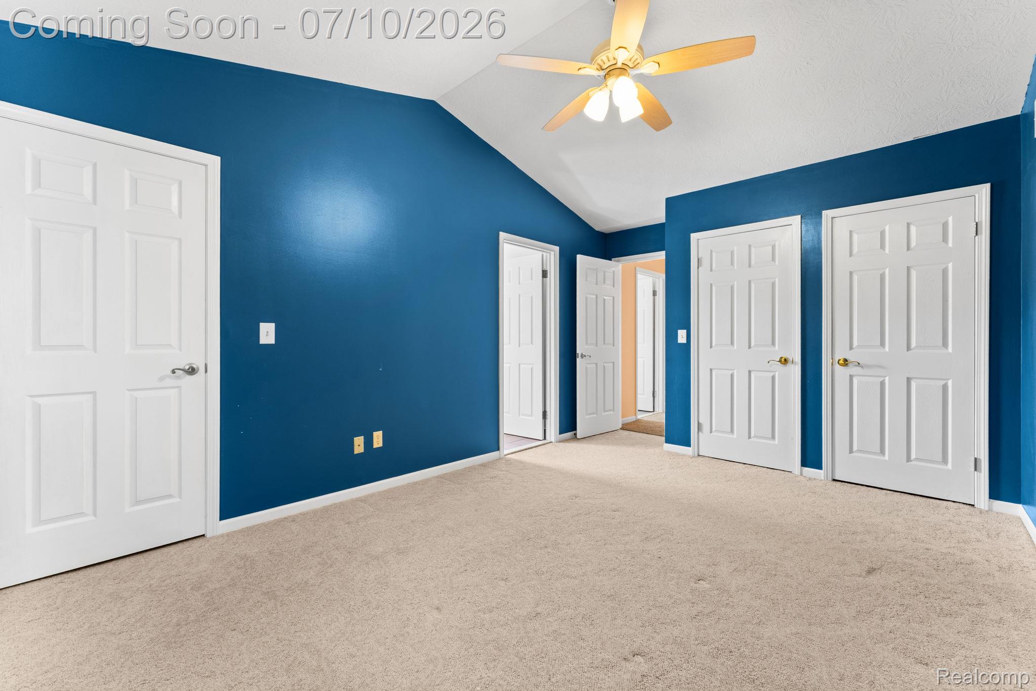 3144 North Nicholson Road Fowlerville, MI 48836 - Photo 53 of 70 Interior room with vaulted ceilings and a ceiling fan light fixture