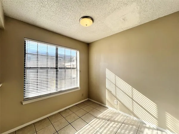a view of a room with windows