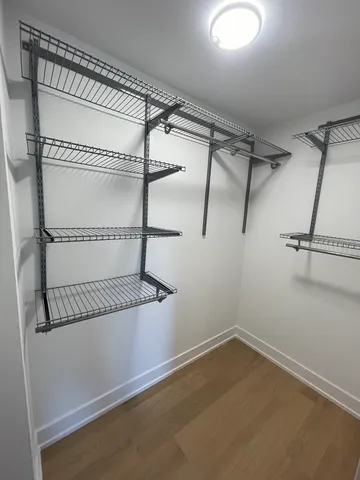 a view of a room with racks on the wall
