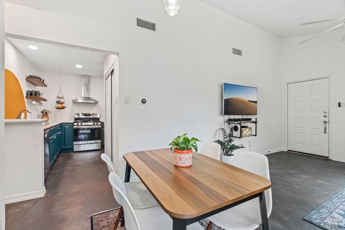 6016 Baton Rouge Drive Austin, TX 78727 - Photo 13 of 29 The dining space is adjacent and opens into the kitchen for efficient mealtime
