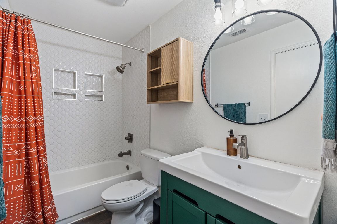 6016 Baton Rouge Drive Austin, TX 78727 - Photo 19 of 29 The Full Bathroom features updated shower / bath combination, vanity.