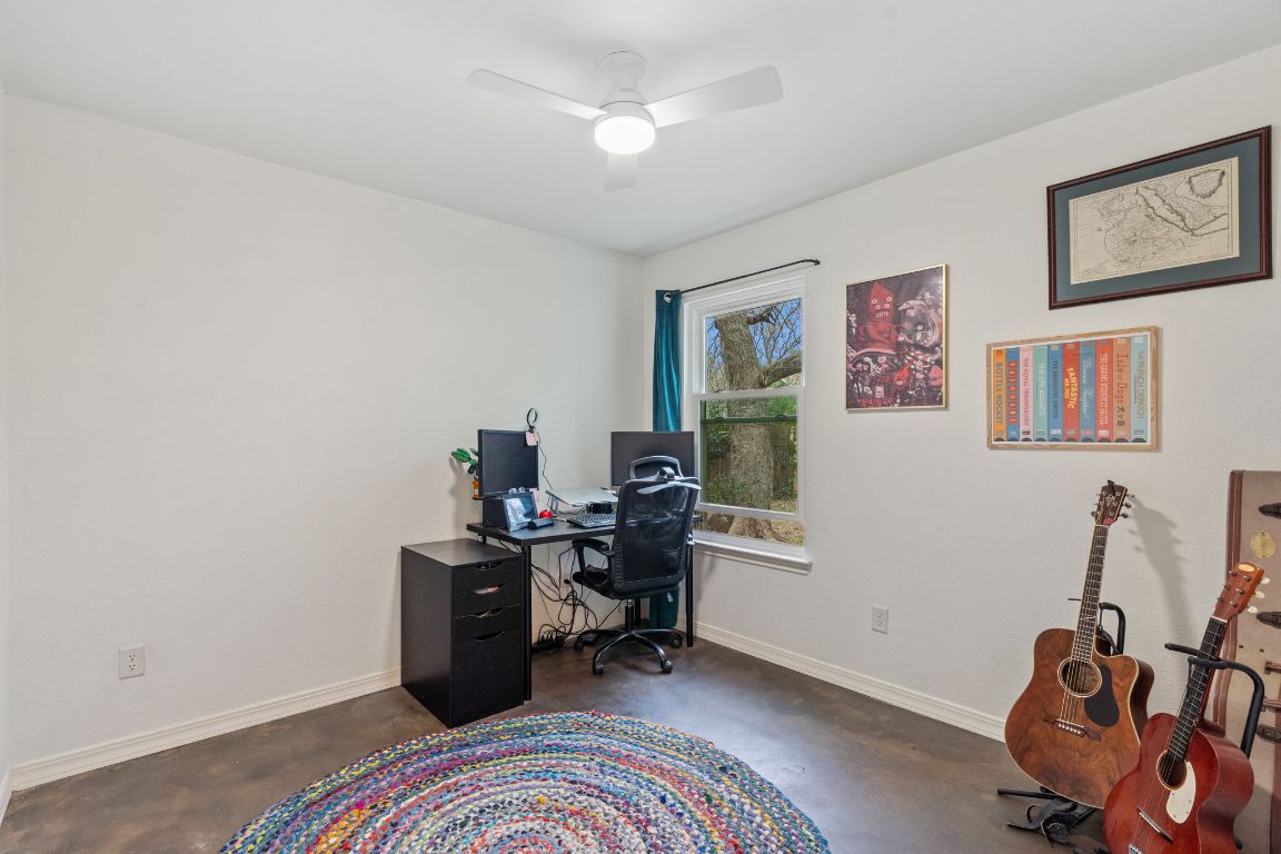 6016 Baton Rouge Drive Austin, TX 78727 - Photo 21 of 29 The second bedroom has a deep, useful closet and makes a great home office.