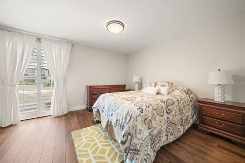 a view of a terrace with a table and chairs