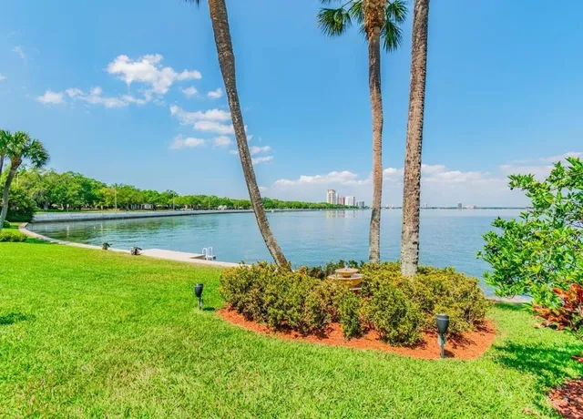 a view of a garden with a fountain