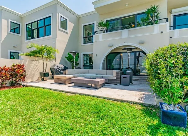 a front view of a house with patio