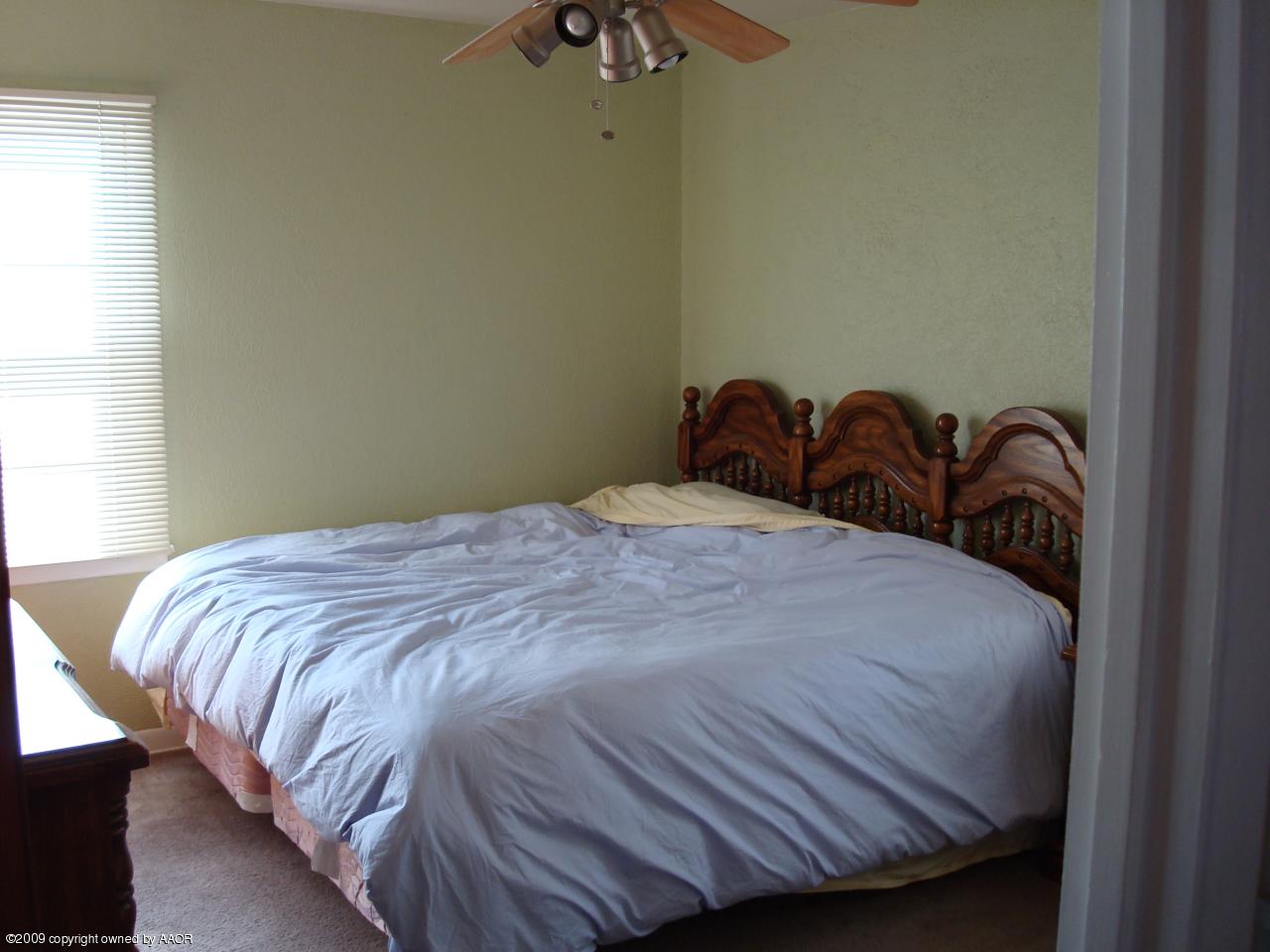 4306 South Ong Street Amarillo, TX 79110 - Photo 8 of 12 Master Bedroom