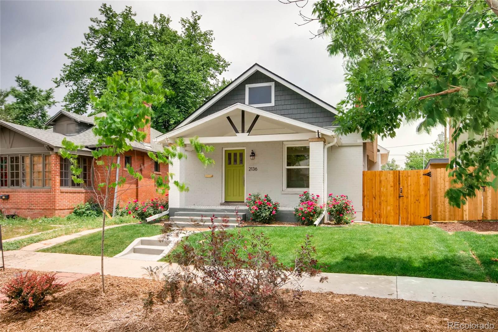 2136 Lowell Boulevard Denver, CO 80211 - Photo 1 of 23 a front view of house with yard and green space