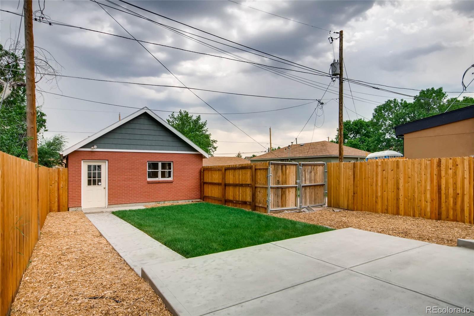 2136 Lowell Boulevard Denver, CO 80211 - Photo 23 of 23 a view of a house with a yard