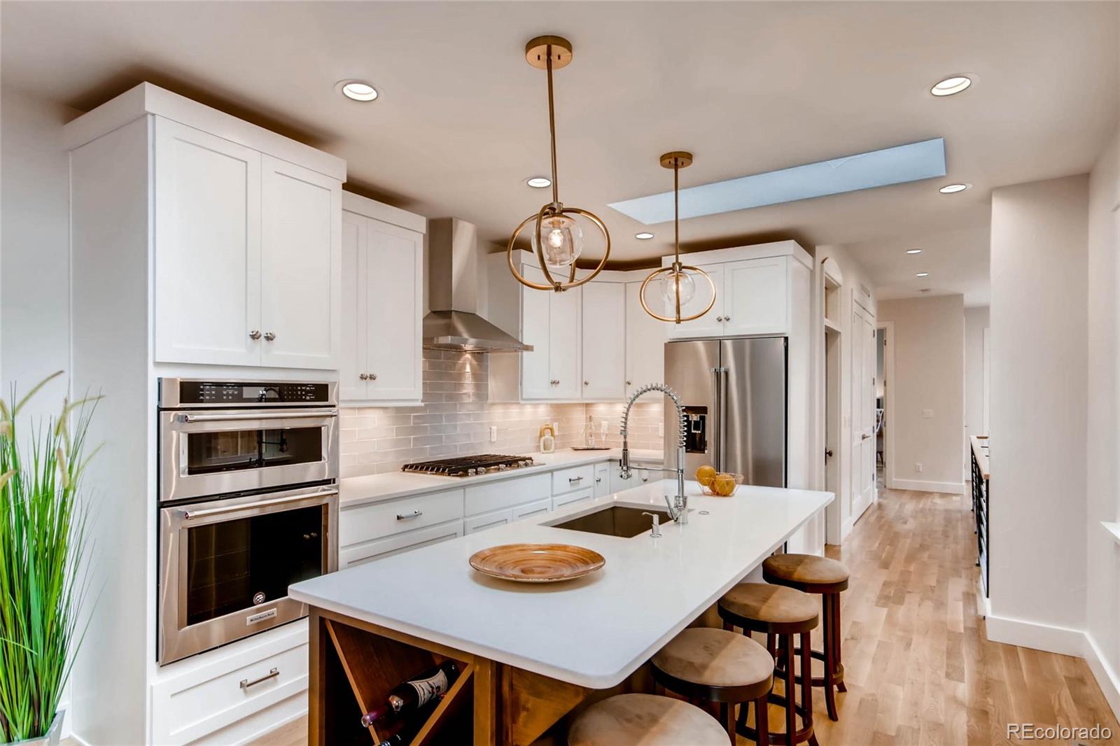 2136 Lowell Boulevard Denver, CO 80211 - Photo 5 of 23 a kitchen with a table and chairs in it