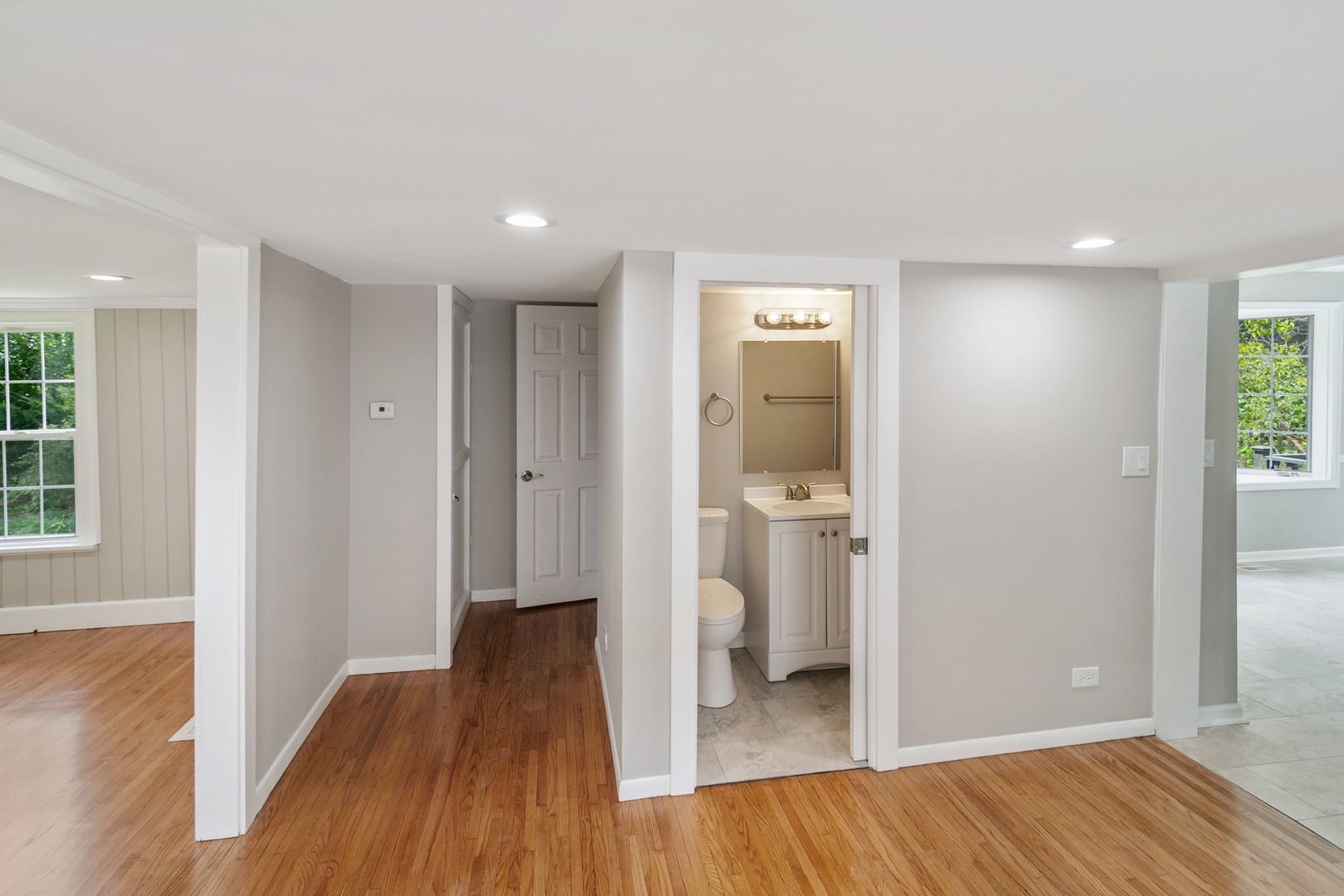 345 Main Street Batavia, IL 60510 - Photo 10 of 25 wooden floor in an empty room with a window