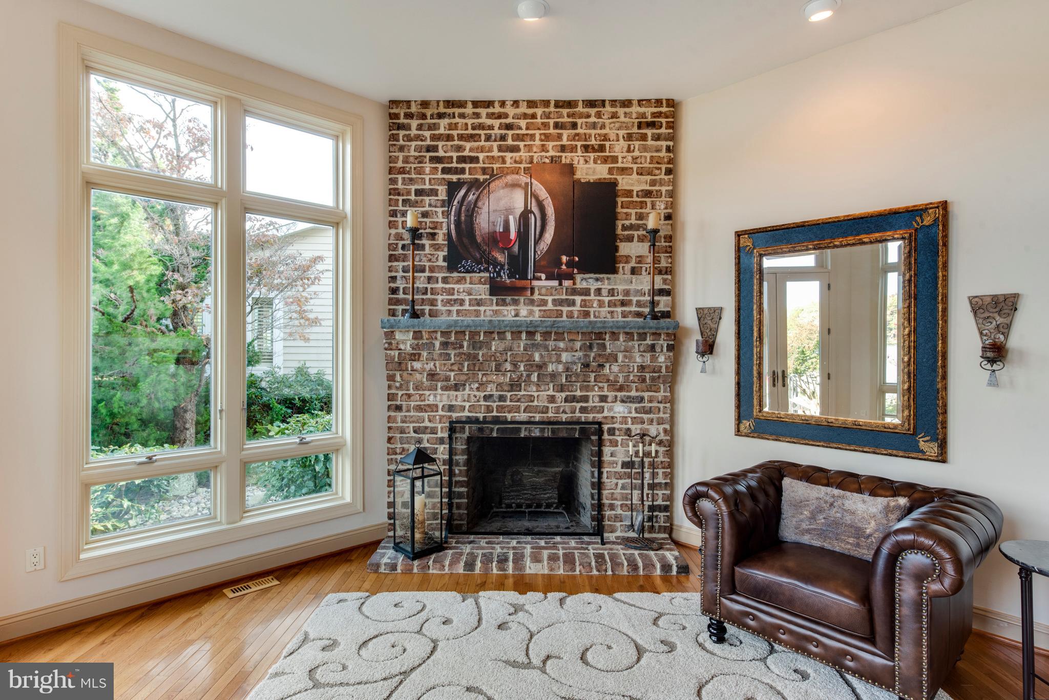 1795 Beachfield Road Annapolis, MD 21409 - Photo 22 of 49 a living room with furniture and a fireplace