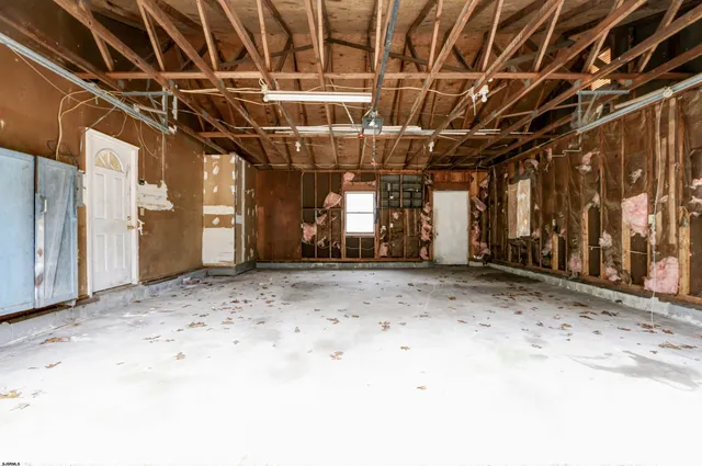 a view of a room with wooden walls