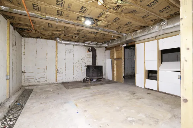 a view of a room with wooden walls