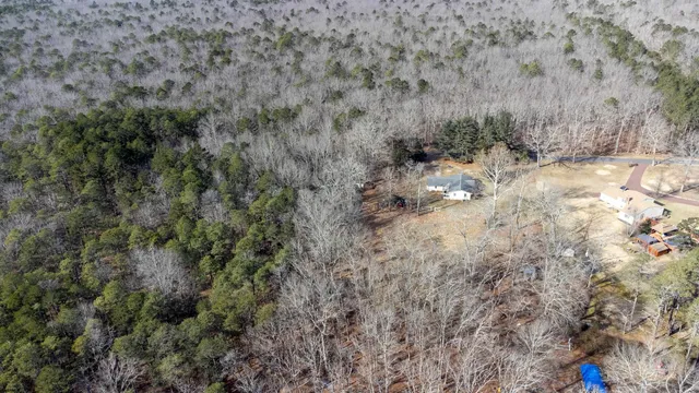 an aerial view of residential house with outdoor space