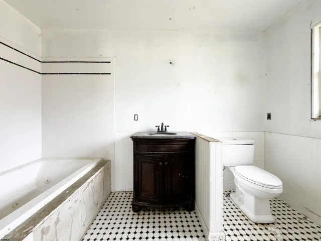 a bathroom with a sink and a toilet