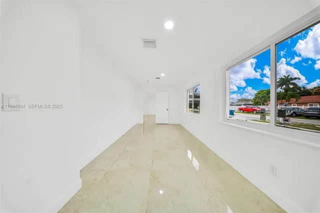 an empty room with windows