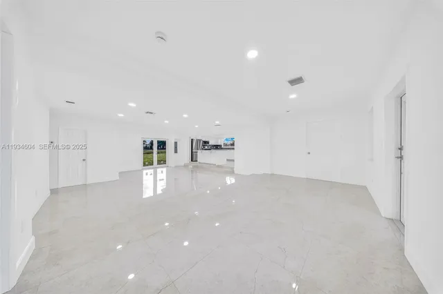 a front view of house with yard and seating area