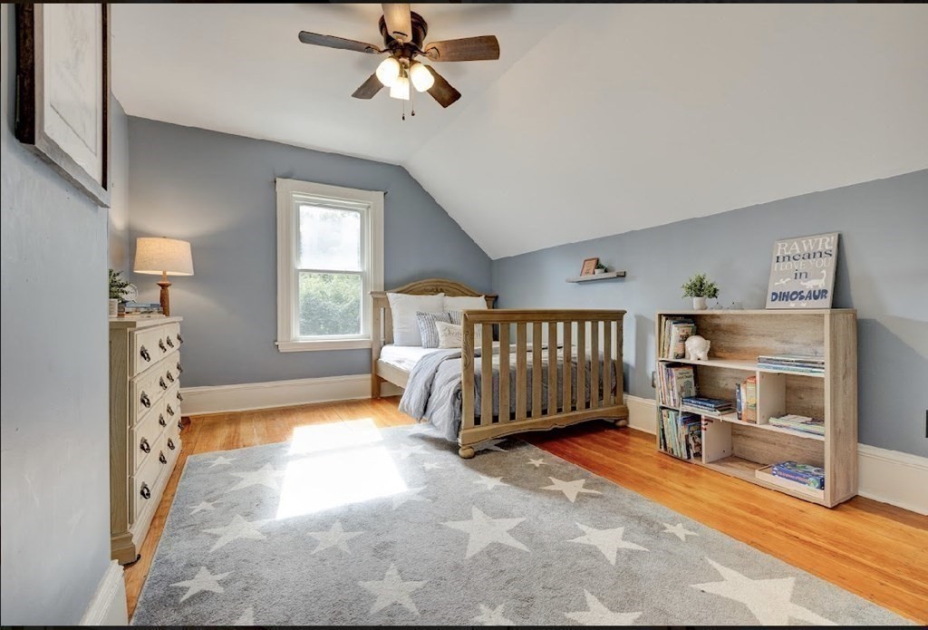 58 Waldo Street Dedham, MA 02026 - Photo 23 of 39 a bedroom with furniture and a window