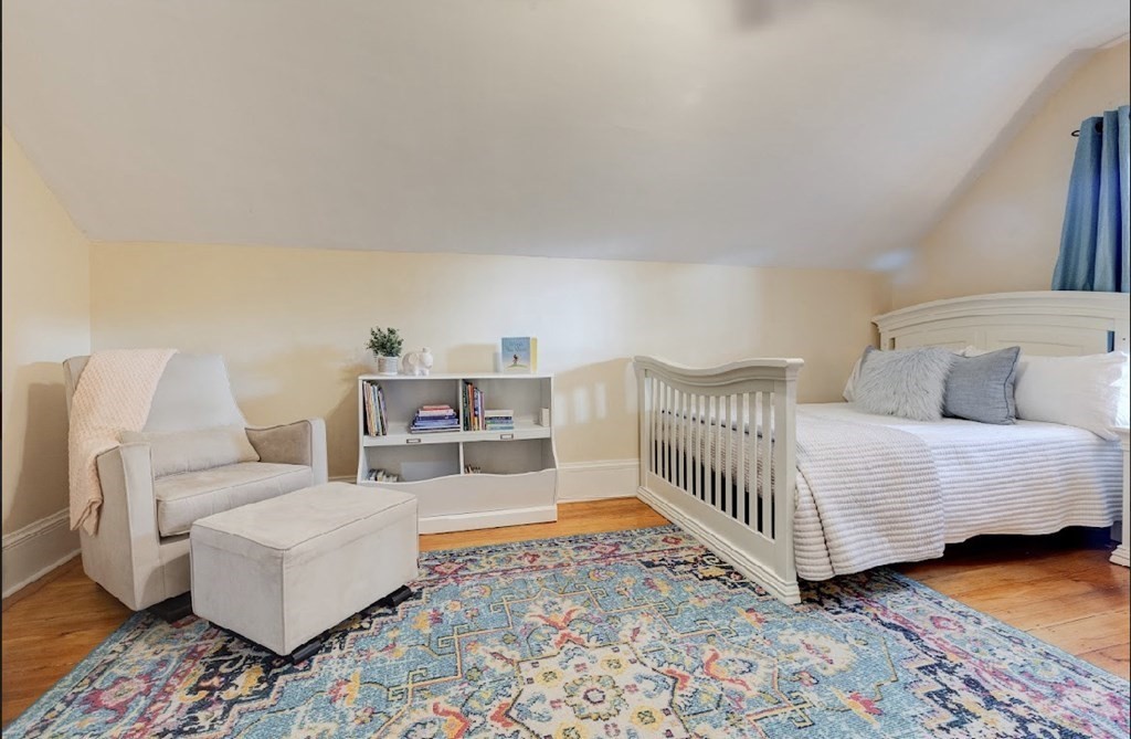 58 Waldo Street Dedham, MA 02026 - Photo 28 of 39 a living room with furniture and a rug