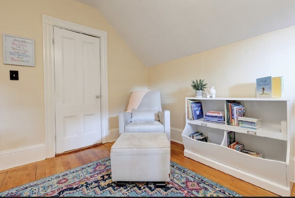 58 Waldo Street Dedham, MA 02026 - Photo 30 of 39 a living room with furniture and a wooden floor