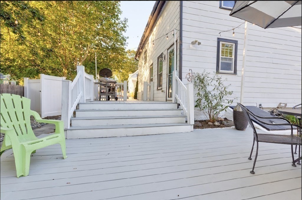 58 Waldo Street Dedham, MA 02026 - Photo 34 of 39 a view of a house with outdoor seating area