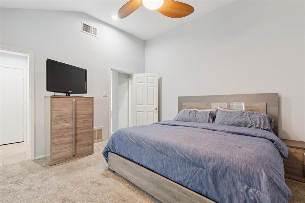 4006 Holland Avenue, Unit B Dallas, TX 75219 - Photo 13 of 28 Primary Bedroom