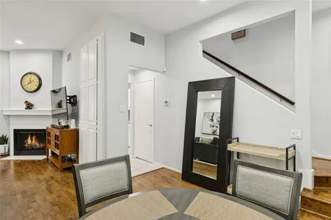 a view of livingroom with furniture and a fireplace