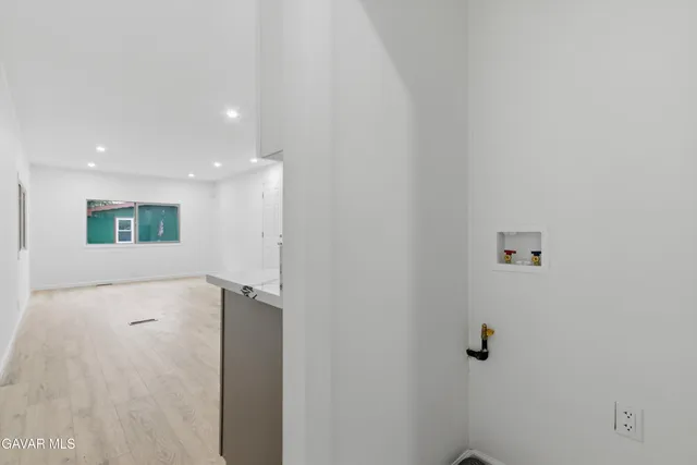 a view of a hallway with closet