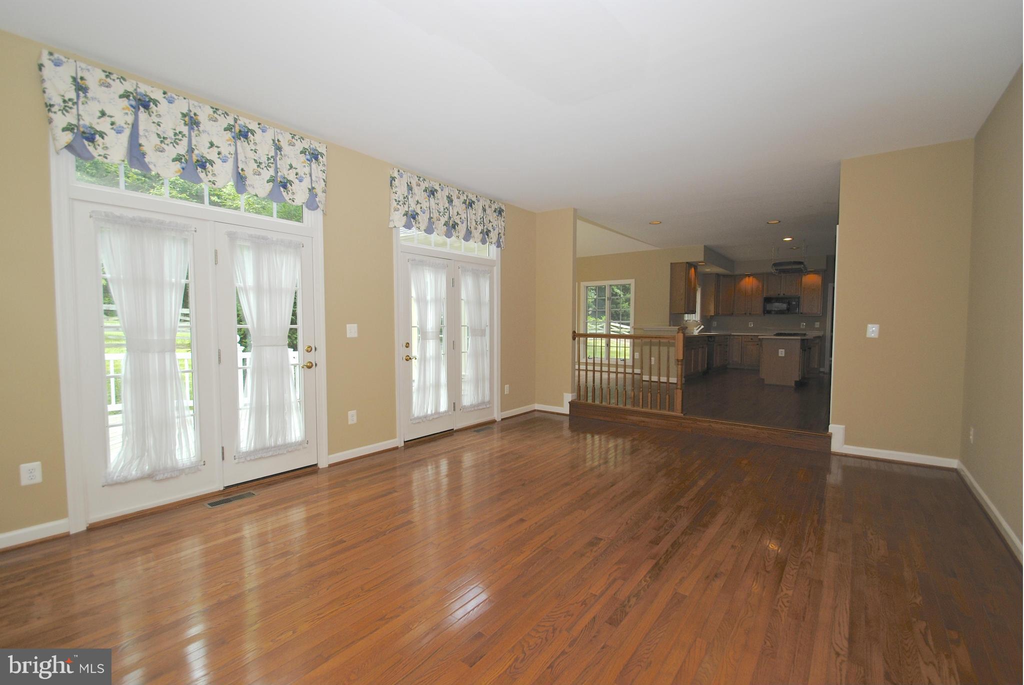 9 Watkins Row Edgewater, MD 21037 - Photo 19 of 30 French doors in Family Room open to deck