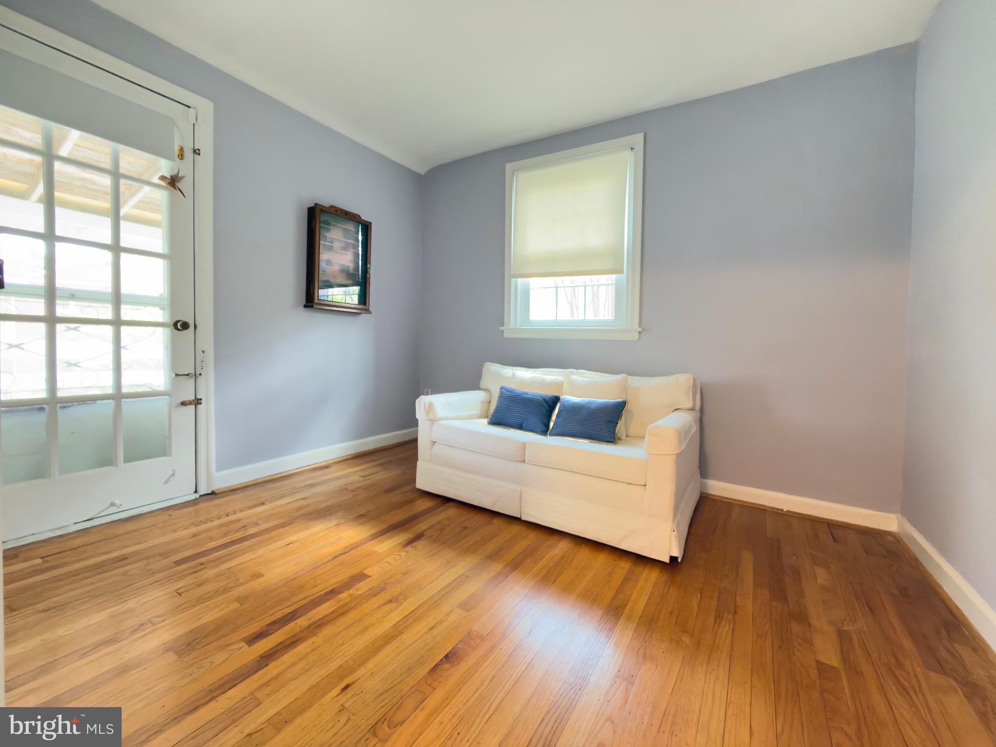 1522 James Road Wynnewood, PA 19096 - Photo 15 of 21 a living room with wooden floor and a window