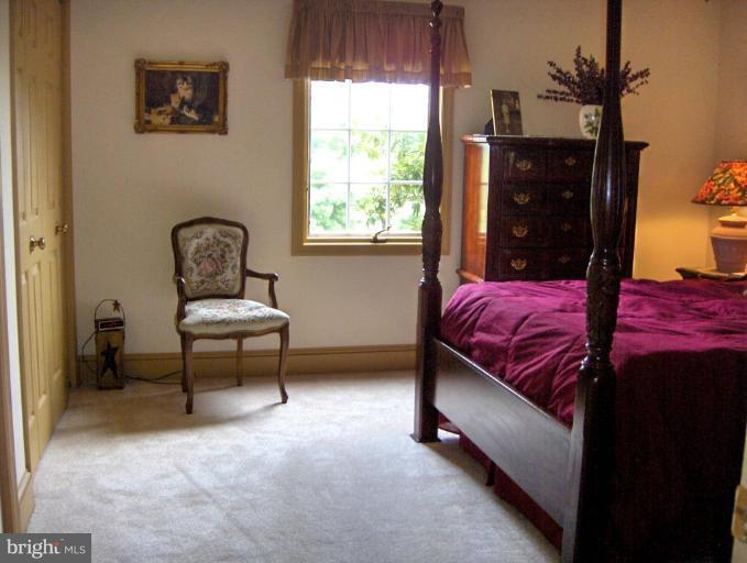 15119 Clear Spring Road Williamsport, MD 21795 - Photo 22 of 30 a bedroom with a bed and a window