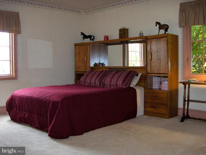 15119 Clear Spring Road Williamsport, MD 21795 - Photo 23 of 30 a bedroom with a bed and window