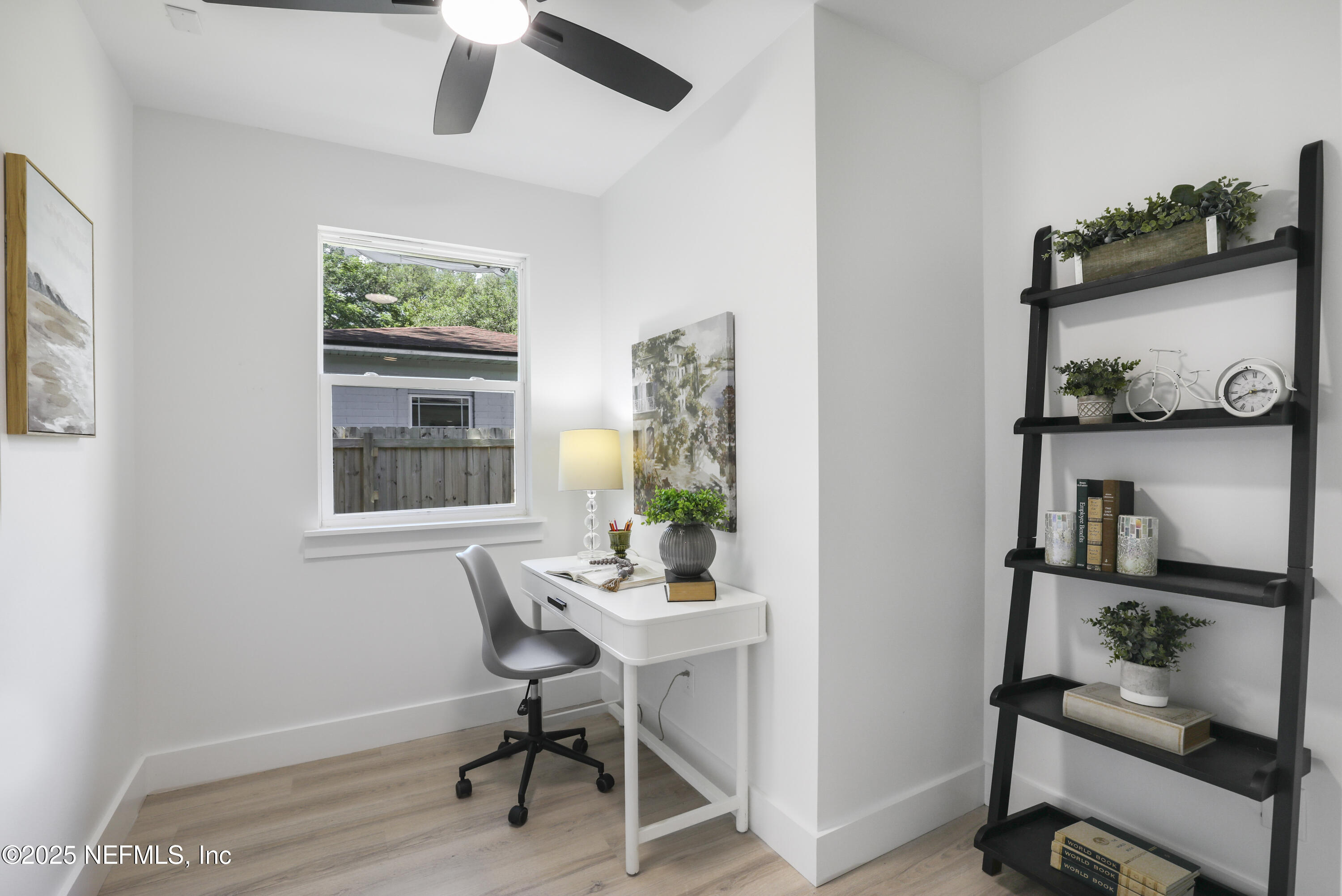 4630 Homestead Road Jacksonville, FL 32210 - Photo 30 of 45 a view of a workspace with furniture and a window
