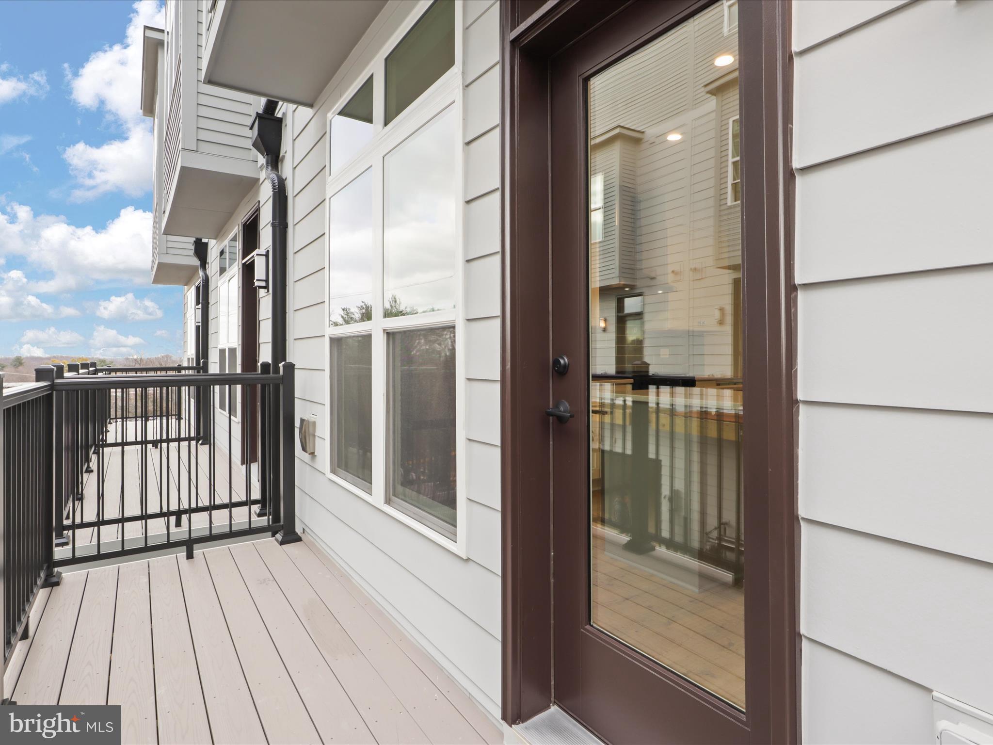 2064 Tysons Ridgeline Road Falls Church, VA 22043 - Photo 17 of 43 a view of balcony with wooden floor