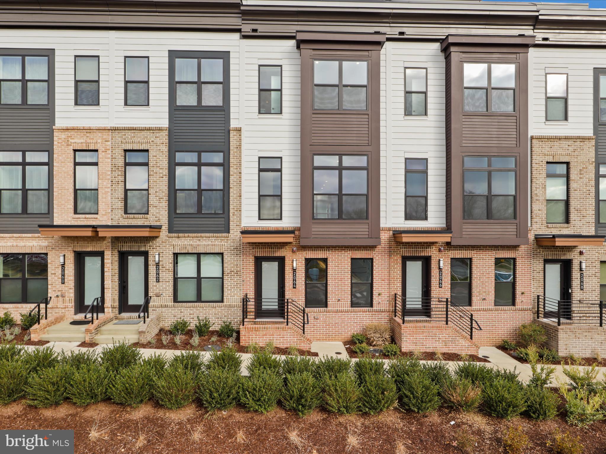 2064 Tysons Ridgeline Road Falls Church, VA 22043 - Photo 2 of 43 front view of a brick building