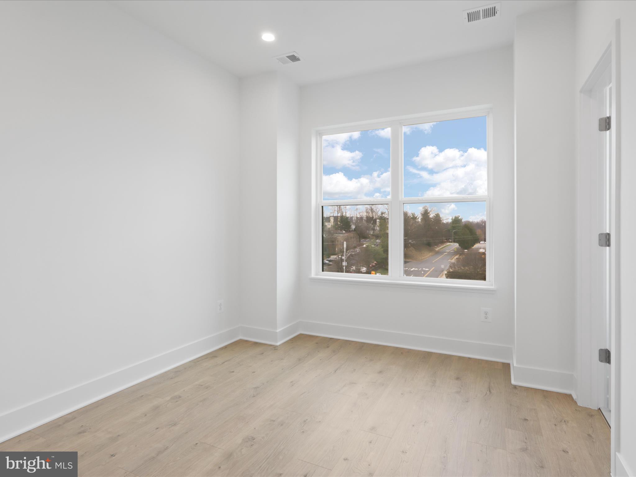 2064 Tysons Ridgeline Road Falls Church, VA 22043 - Photo 24 of 43 an empty room with a window