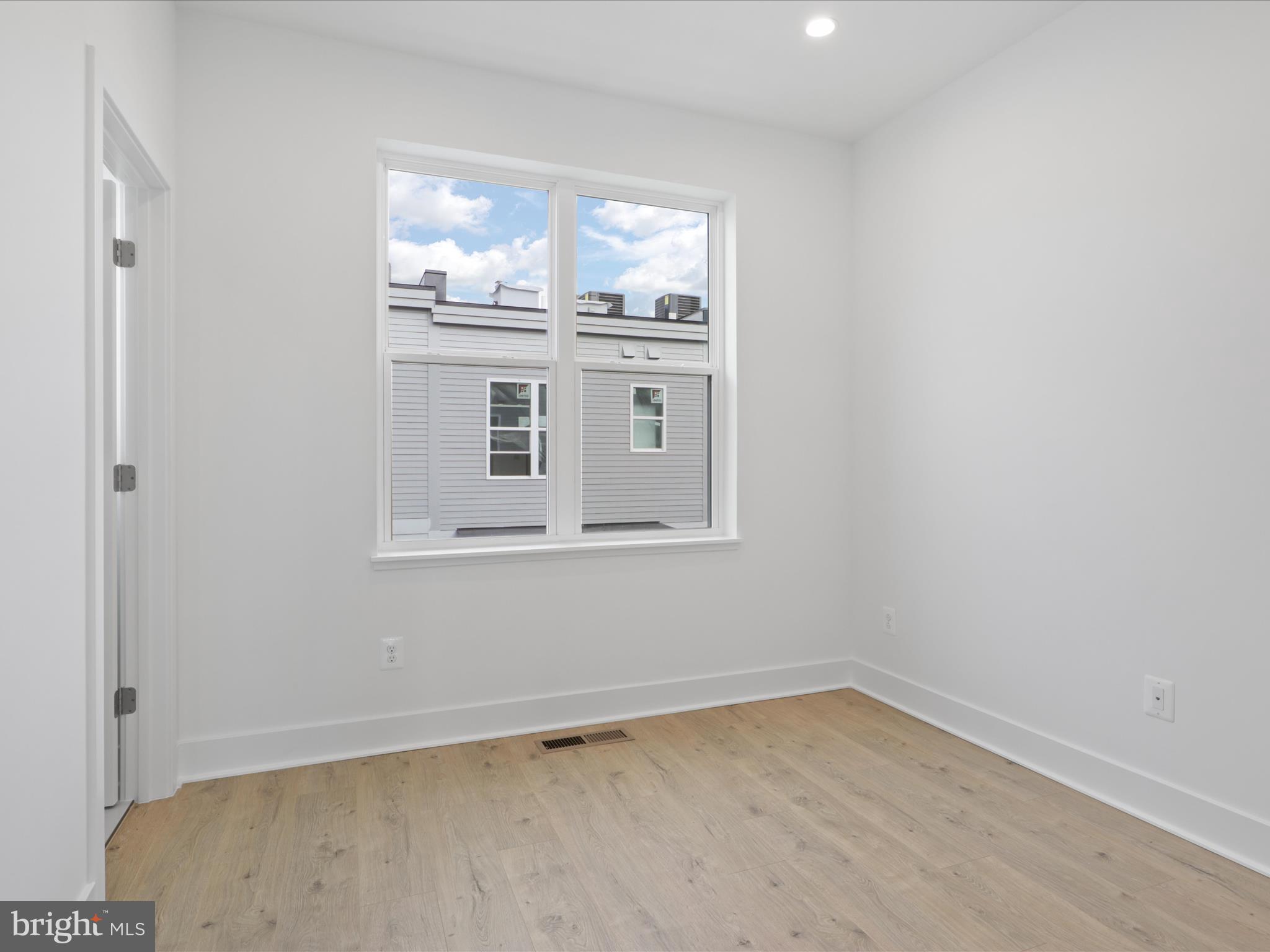 2064 Tysons Ridgeline Road Falls Church, VA 22043 - Photo 31 of 43 a view of wooden floor and cabinet in a room
