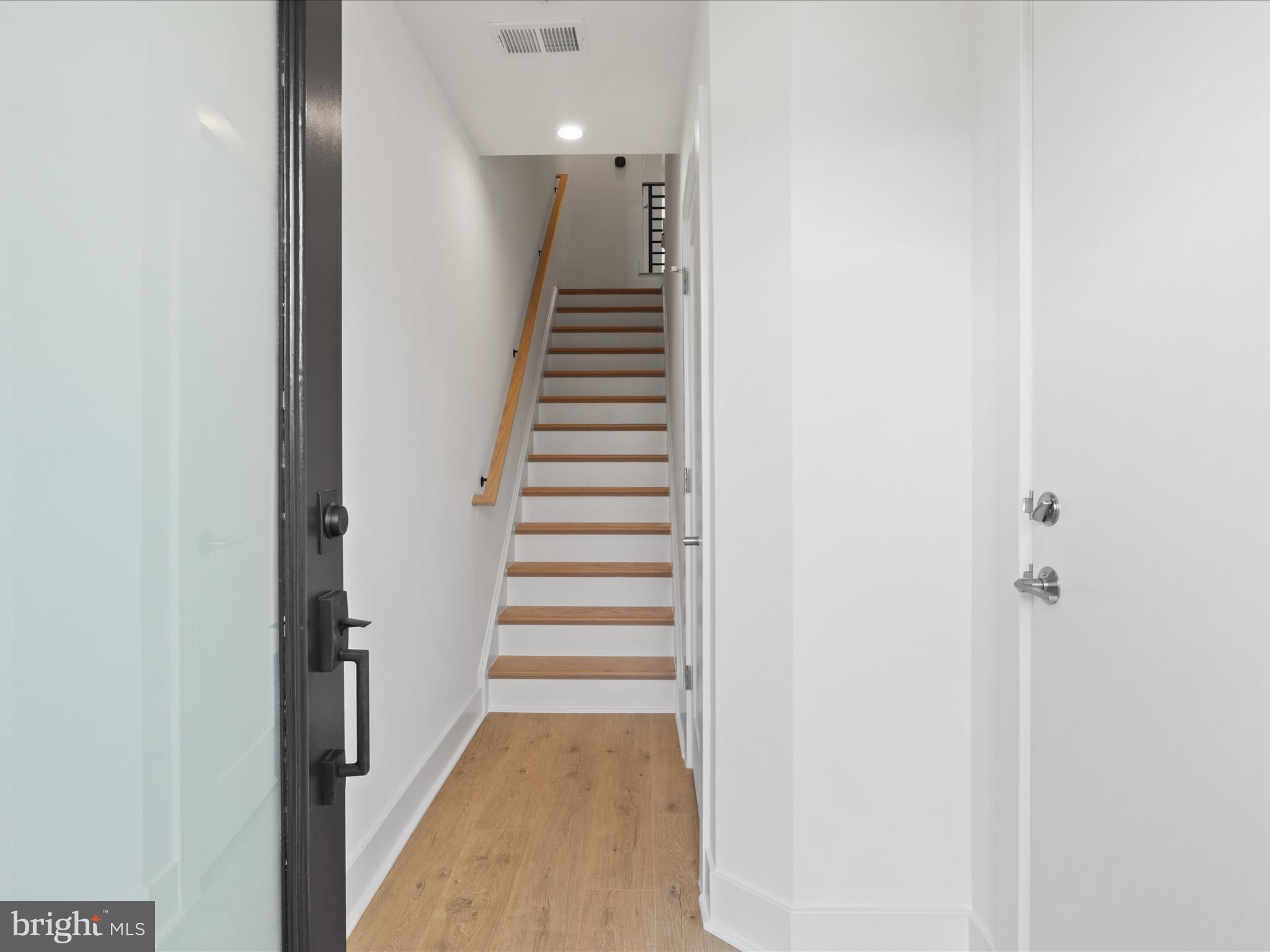 2064 Tysons Ridgeline Road Falls Church, VA 22043 - Photo 6 of 43 a view of a hallway with stairs