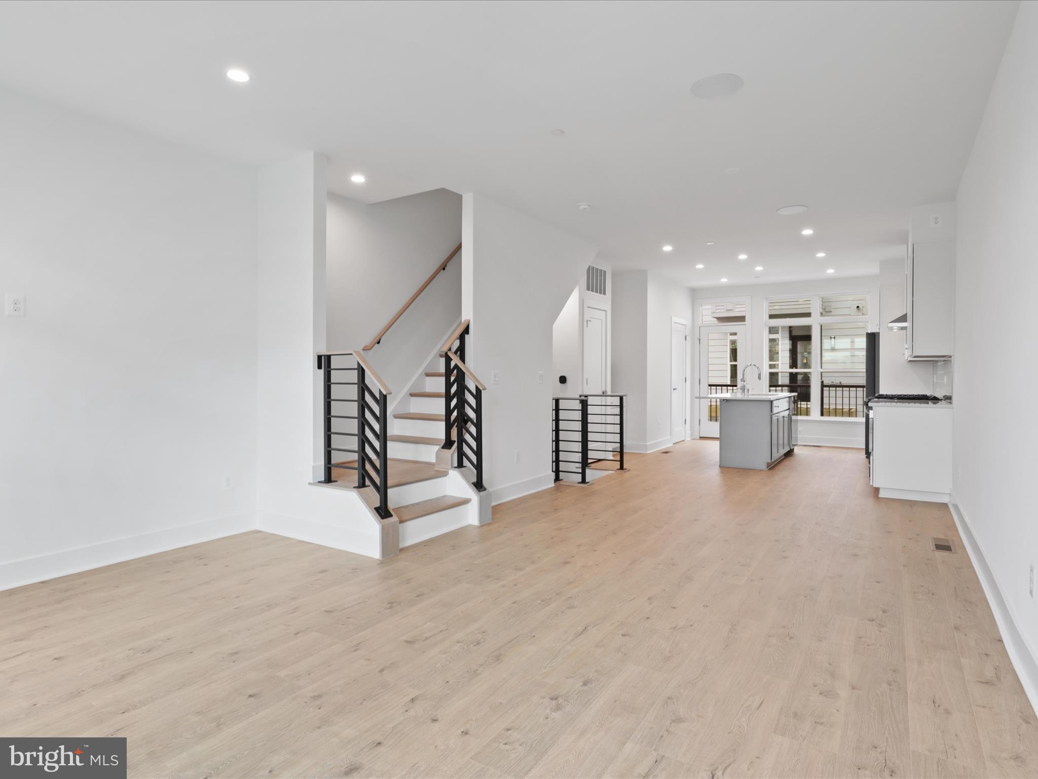 2064 Tysons Ridgeline Road Falls Church, VA 22043 - Photo 8 of 43 a view of a hall with wooden floor