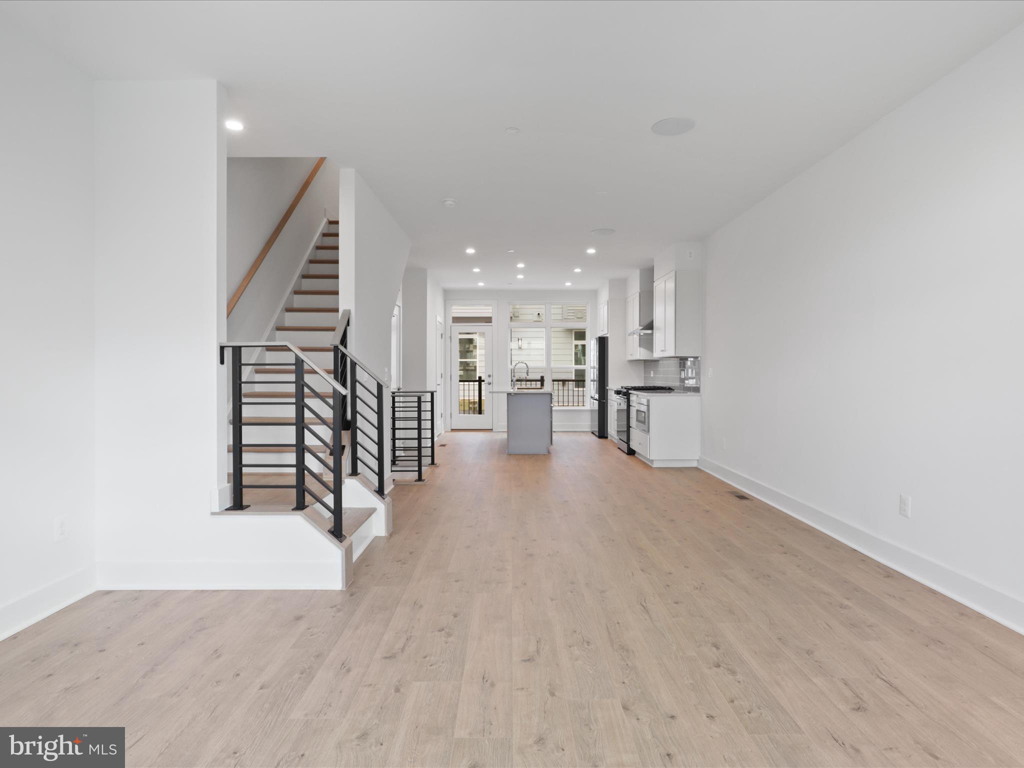 2064 Tysons Ridgeline Road Falls Church, VA 22043 - Photo 9 of 43 a view of empty room with wooden floor