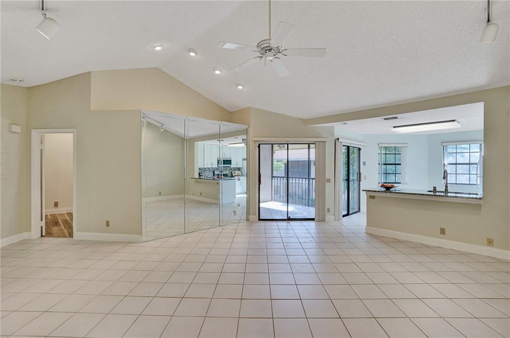6698 Montego Bay Boulevard, Unit D Boca Raton, FL 33433 - Photo 23 of 44 a view of an empty room and window