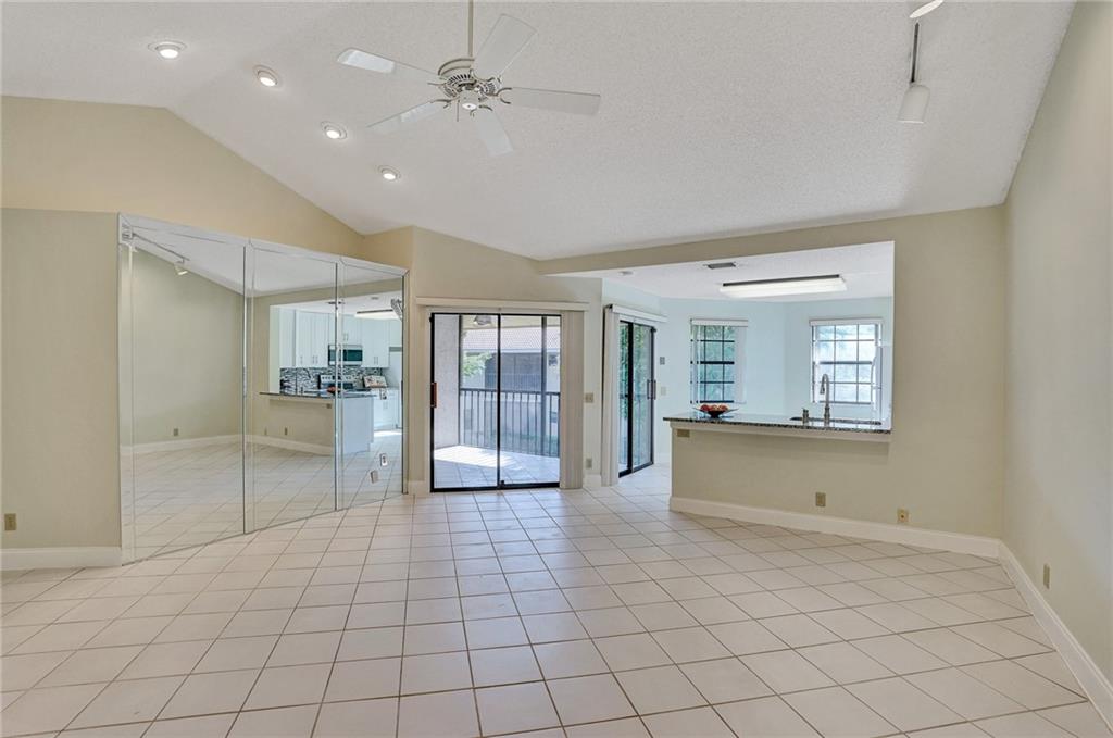 6698 Montego Bay Boulevard, Unit D Boca Raton, FL 33433 - Photo 24 of 44 a view of an entryway with wooden floor