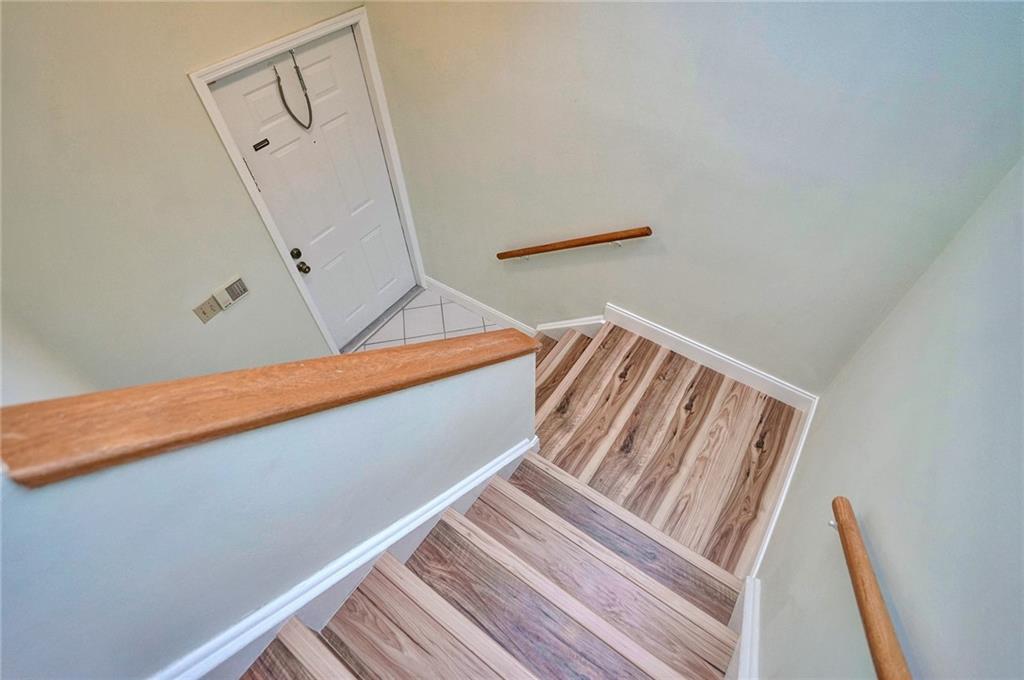 6698 Montego Bay Boulevard, Unit D Boca Raton, FL 33433 - Photo 29 of 44 a view of wooden floor