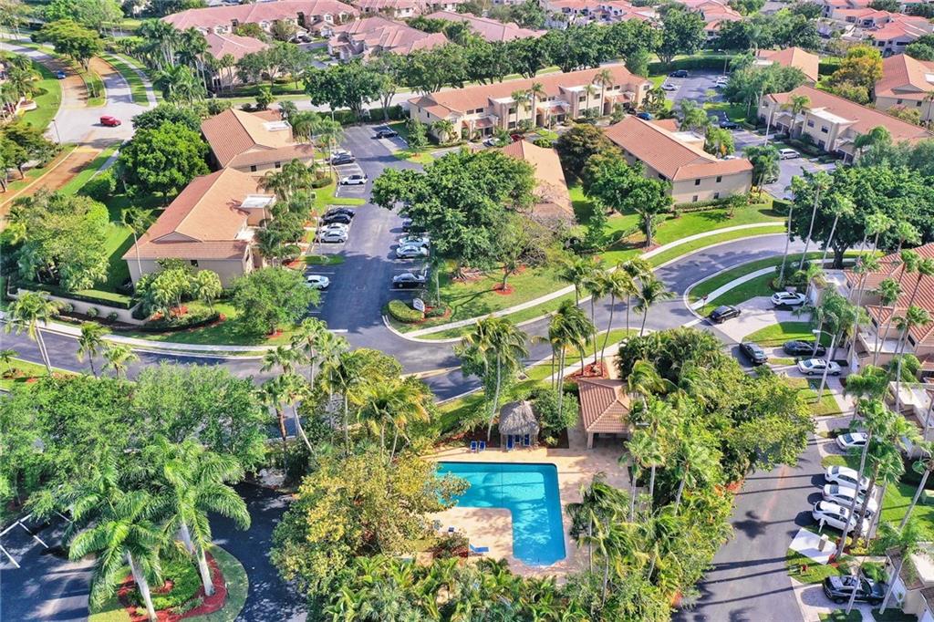 6698 Montego Bay Boulevard, Unit D Boca Raton, FL 33433 - Photo 34 of 44 an aerial view of residential houses with outdoor space and street view